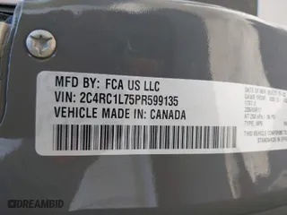 2023 Chrysler Pacifica Hybrid Touring L with VIN 2C4RC1L75PR599135, listed as a IAAI auction lot 39785830 with 28,781 mi miles. Bid and sale history available at carsss.com. Image 9.