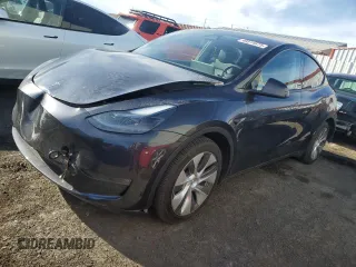 2024 Tesla Model Y Long Range with VIN 7SAYGDEE2RA252101, listed as a Copart auction lot 49514675 with 19,399 mi miles and Salvage Title. Bid and sale history available at DreamBid. Image 1.