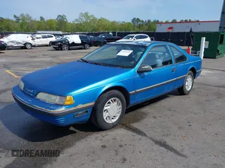 1990 Ford Thunderbird with VIN 1FAPP6248LH206157, listed as a IAAI auction lot 41915948 with 165,340 mi miles and . Bid and sale history available at DreamBid. Image 2.