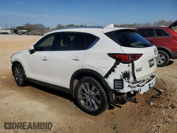 2021 Mazda CX-5 Signature with VIN JM3KFBEY5M0352778, listed as a Copart auction lot 47016035 with 37,961 mi miles and Salvage Title. Bid and sale history available at carsss.com. Image 2.