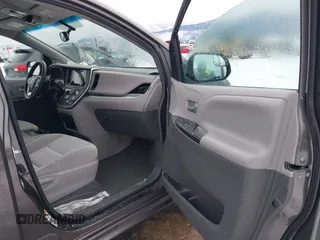 2016 Toyota Sienna LE with VIN 5TDJK3DC6GS142669, listed as a IAAI auction lot 41436771 with 135,715 mi miles. Bid and sale history available at carsss.com. Image 5.