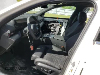 2024 BMW i5 eDrive40 with VIN WBY33FK05RCR50188, listed as a Copart auction lot 52953195 with 423 mi miles and Salvage title. Bid and sale history available at DreamBid. Image 7.