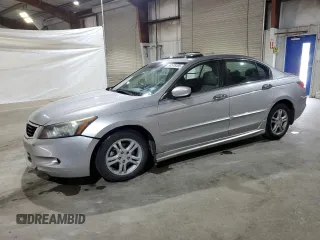 2010 Honda Accord EX-L z VIN 1HGCP3F86AA014148, wystawiony jako Copart lot #57576105 z przebiegiem 170 536 mil mil oraz Czysty tytuł • Clean title. Historia ofert i sprzedaży dostępna na DreamBid. Obrazek 1.
