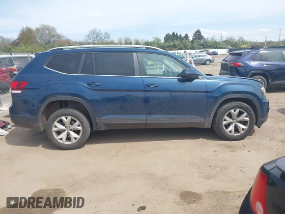 2018 Volkswagen Atlas SE with VIN 1V2KR2CA8JC575136, listed as a IAAI auction lot 42145011 with 139,107 mi miles and . Bid and sale history available at DreamBid. Image 13.
