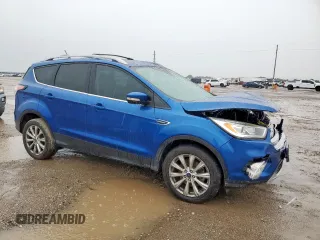 2018 Ford Escape Titanium with VIN 1FMCU9J98JUB31234, listed as a Copart auction lot 58817705 with 140,183 mi miles and Salvage title. Bid and sale history available at DreamBid. Image 4.