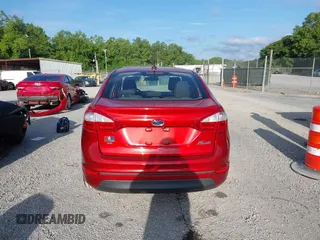 2019 Ford Fiesta SE z VIN 3FADP4BJXKM122235, wystawiony jako IAAI lot #42457164 z przebiegiem 103 265 mil mil oraz . Historia ofert i sprzedaży dostępna na DreamBid. Obrazek 16.