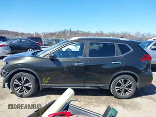 2017 Nissan Rogue SL with VIN JN8AT2MT8HW395084, listed as a IAAI auction lot 41858587 with 219,849 mi miles and . Bid and sale history available at DreamBid. Image 14.