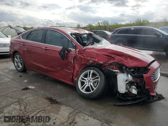 2015 Ford Fusion Titanium Hybrid with VIN 3FA6P0RUXFR247357, listed as a Copart auction lot 55943975 with 112,278 mi miles and Salvage title. Bid and sale history available at DreamBid. Image 4.
