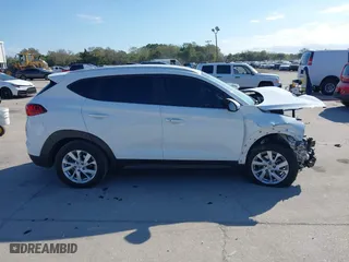 2019 Hyundai Tucson Value with VIN KM8J33A42KU024497, listed as a IAAI auction lot 41607693 with 70,792 mi miles. Bid and sale history available at carsss.com. Image 14.