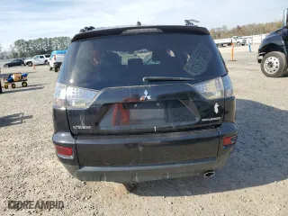 2010 Mitsubishi Outlander SE with VIN JA4AS3AW1AZ014063, listed as a Copart auction lot 79934964 with 140,404 mi miles and Salvage Title. Bid and sale history available at carsss.com. Image 6.