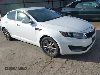 2013 Kia Optima EX z VIN 5XXGN4A71DG104519, wystawiony jako IAAI lot #41691746 z przebiegiem 199 469 mil mil oraz . Historia ofert i sprzedaży dostępna na DreamBid. Obrazek 1.
