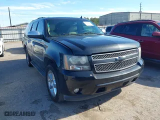 2011 Chevrolet Suburban LTZ with VIN 1GNSCKE0XBR198144, listed as a IAAI auction lot 41299360 with 217,972 mi miles. Bid and sale history available at carsss.com. Image 1.
