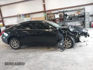 2016 Mazda 6 i Sport with VIN JM1GJ1U57G1414288, listed as a IAAI auction lot 42066672 with 133,000 mi miles and . Bid and sale history available at DreamBid. Image 13.
