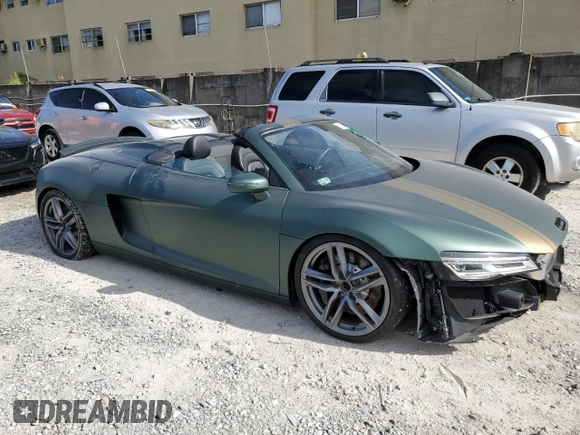 2015 Audi R8 z VIN WUASUAFG1F7001863, wystawiony jako Copart lot #68133794 z przebiegiem 10 571 mil mil oraz Szkody całkowita. Historia ofert i sprzedaży dostępna na DreamBid. Obrazek 4.