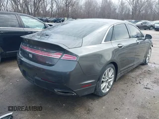 2015 Lincoln MKZ z VIN 3LN6L2JK4FR623686, wystawiony jako IAAI lot #41721095 z przebiegiem 197 922 mil mil oraz . Historia ofert i sprzedaży dostępna na DreamBid. Obrazek 4.