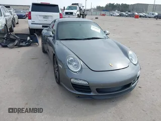 2009 Porsche 911 Carrera S with VIN WP0AB29959S721671, listed as a IAAI auction lot 41548285 with 54,853 mi miles. Bid and sale history available at carsss.com. Image 1.