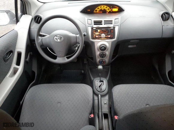 2009 Toyota Yaris with VIN JTDKT903395249312, listed as a Copart auction lot 49494835 with 294,865 mi miles and Clean Title. Bid and sale history available at carsss.com. Image 8.