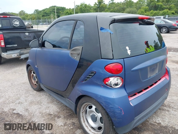 2013 Smart fortwo Pure with VIN WMEEJ3BA6DK664115, listed as a IAAI auction lot 42412198 with 64,522 mi miles and . Bid and sale history available at DreamBid. Image 3.