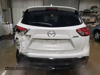 2014 Mazda CX-5 Grand Touring with VIN JM3KE4DY7E0417308, listed as a Copart auction lot 88161195 with 107,493 mi miles and Salvage Title. Bid and sale history available at carsss.com. Image 6.