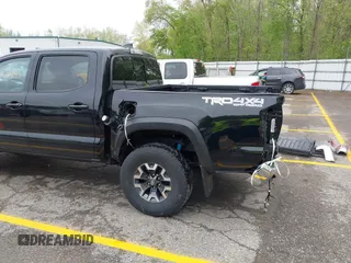 2021 Toyota Tacoma SR with VIN 3TMCZ5AN0MM417261, listed as a IAAI auction lot 42240693 with 38,625 mi miles and . Bid and sale history available at DreamBid. Image 22.