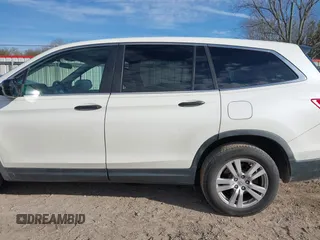 2016 Honda Pilot LX with VIN 5FNYF5H16GB033964, listed as a IAAI auction lot 41607930 with 168,137 mi miles and . Bid and sale history available at DreamBid. Image 14.