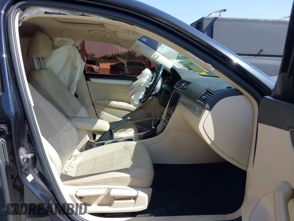 2019 Volkswagen Passat 2.0T Wolfsburg Edition with VIN 1VWLA7A30KC009646, listed as a IAAI auction lot 39842320 with 101,006 mi miles. Bid and sale history available at carsss.com. Image 5.