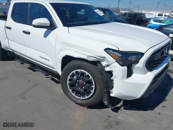 2024 Toyota Tacoma 4WD SR5 with VIN 3TMLB5JN1RM050446, listed as a IAAI auction lot 41658922 with 9,369 mi miles. Bid and sale history available at carsss.com. Image 6.