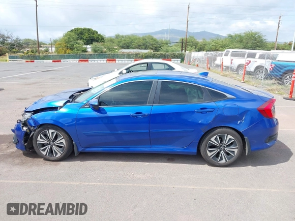 2018 Honda Civic EX-T z VIN JHMFC1F31JX018152, wystawiony jako IAAI lot #41935394 z przebiegiem 60 333 mil mil oraz . Historia ofert i sprzedaży dostępna na DreamBid. Obrazek 14.