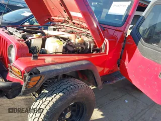 1997 Jeep Wrangler SE z VIN 1J4FY29PXVP476036, wystawiony jako IAAI lot #41882559 z przebiegiem 82 888 mil mil oraz . Historia ofert i sprzedaży dostępna na DreamBid. Obrazek 6.