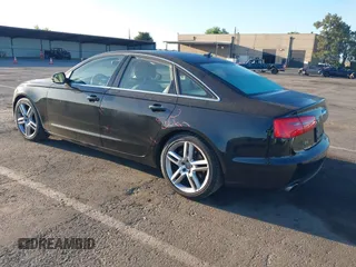 2014 Audi A6 Premium Plus with VIN WAUGFAFC7EN014764, listed as a IAAI auction lot 42261384 with 117,285 mi miles and . Bid and sale history available at DreamBid. Image 3.