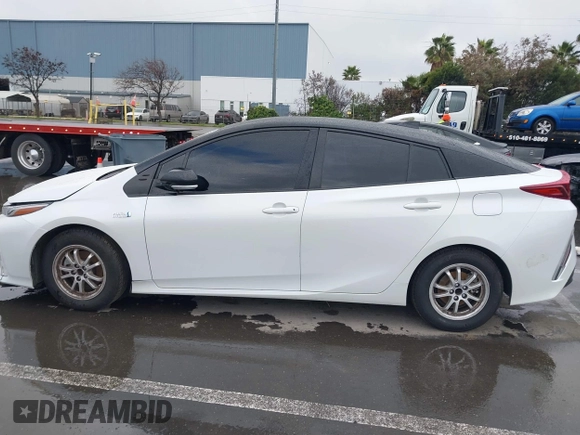 2021 Toyota Prius LE with VIN JTDKAMFP0M3169019, listed as a IAAI auction lot 41481098 with 84,304 mi miles and . Bid and sale history available at DreamBid. Image 14.