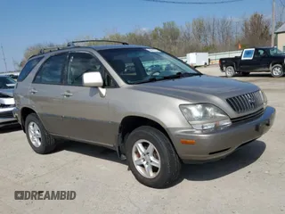 1999 Lexus RX 300 with VIN JT6HF10UXX0018047, listed as a Copart auction lot 52810725 with 211,803 mi miles and Clean Title. Bid and sale history available at DreamBid. Image 4.