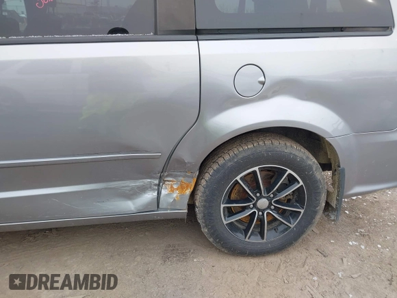 2014 Dodge Grand Caravan SXT with VIN 2C4RDGCGXER308657, listed as a IAAI auction lot 41602422 with 200,643 mi miles and . Bid and sale history available at DreamBid. Image 6.