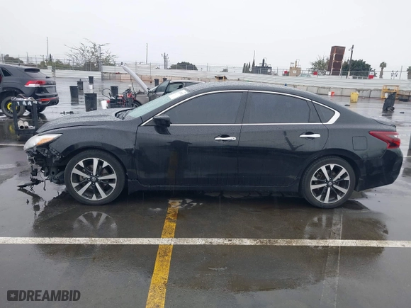 2018 Nissan Altima 2.5 SV with VIN 1N4AL3AP9JC117719, listed as a IAAI auction lot 41720521 with 103,541 mi miles. Bid and sale history available at carsss.com. Image 15.