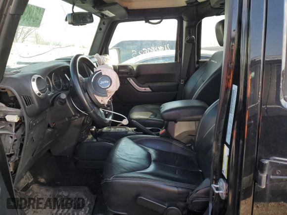 2015 Jeep Wrangler Unlimited Rubicon Hard Rock with VIN 1C4HJWFG4FL676868, listed as a Copart auction lot 48489525 with 100,771 mi miles and Salvage title. Bid and sale history available at DreamBid. Image 7.