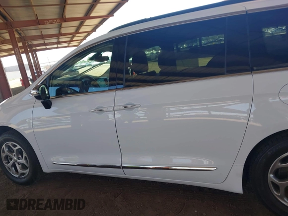 2023 Chrysler Pacifica Limited with VIN 2C4RC1GG6PR533414, listed as a IAAI auction lot 42455618 with 53,834 mi miles and . Bid and sale history available at DreamBid. Image 14.
