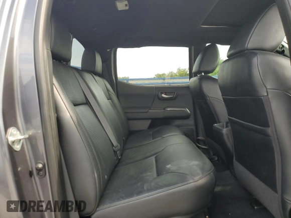 2020 Toyota Tacoma SR5 z VIN 3TYDZ5BN9LT000209, wystawiony jako Copart lot #56127875 z przebiegiem 92 350 mil mil oraz Szkoda całkowita • Salvage title. Historia ofert i sprzedaży dostępna na DreamBid. Obrazek 10.