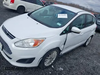 2014 Ford C-Max SE with VIN 1FADP5AU7EL504732, listed as a IAAI auction lot 41739282 with 60,801 mi miles. Bid and sale history available at carsss.com. Image 2.