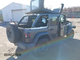 2019 Jeep Wrangler Unlimited Sport S with VIN 1C4HJXDG7KW572294, listed as a IAAI auction lot 41607986 with 61,734 mi miles and . Bid and sale history available at DreamBid. Image 4.