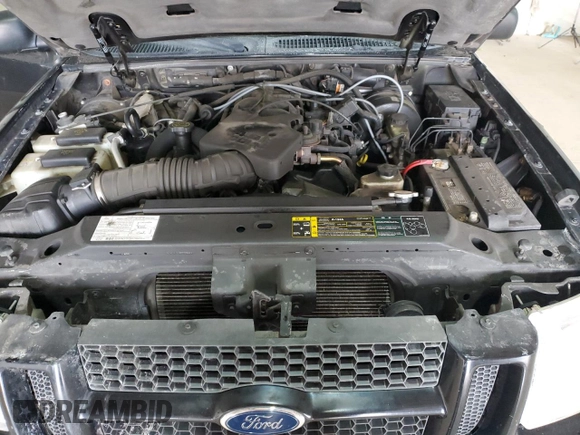 2005 Ford Explorer Sport Trac XLS with VIN 1FMDU77KX5UB63725, listed as a Copart auction lot 49386155 with 165,293 mi miles and Salvage title. Bid and sale history available at DreamBid. Image 11.