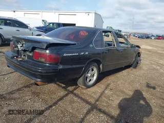 1995 Chevrolet Caprice with VIN 1G1BL52P3SR145712, listed as a IAAI auction lot 41954561 with Not Provided miles and . Bid and sale history available at DreamBid. Image 4.