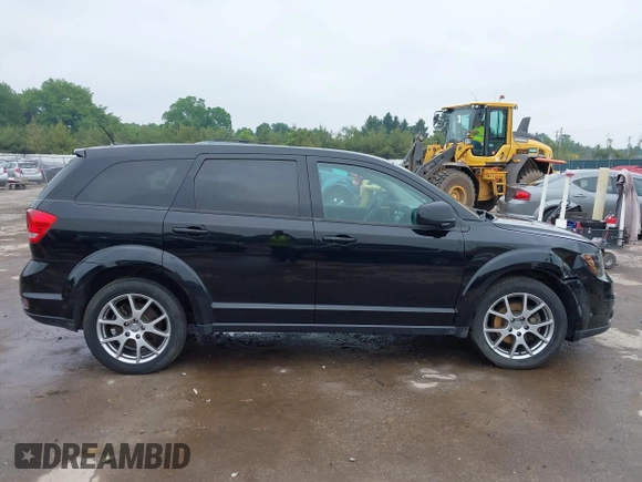 2015 Dodge Journey R/T with VIN 3C4PDDEG1FT554904, listed as a IAAI auction lot 42415888 with 143,039 mi miles and . Bid and sale history available at DreamBid. Image 13.