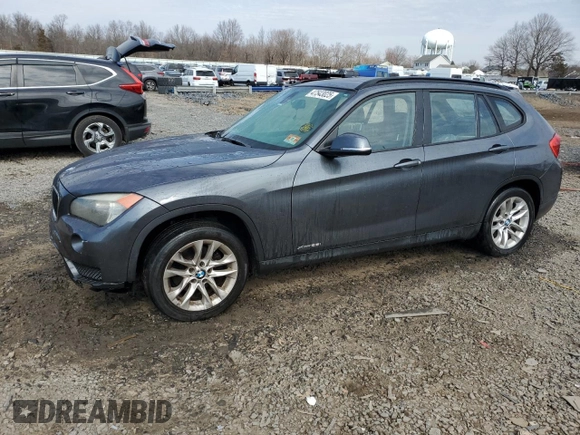 2015 BMW X1 xDrive28i with VIN WBAVL1C5XFVY31265, listed as a Copart auction lot 47543025 with 124,986 mi miles and Salvage Title. Bid and sale history available at carsss.com. Image 1.