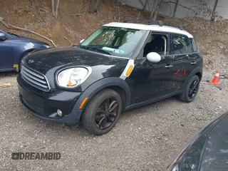 2012 MINI Countryman with VIN WMWZB3C5XCWM30191, listed as a IAAI auction lot 42435291 with 103,254 mi miles and . Bid and sale history available at DreamBid. Image 2.