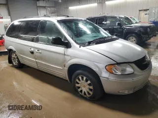 2001 Chrysler Town & Country LXi with VIN 2C8GP54L31R375236, listed as a Copart auction lot 85763534 with 193,013 mi miles and Salvage Title. Bid and sale history available at DreamBid. Image 4.