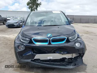2017 BMW i3 z VIN WBY1Z8C5XHV889564, wystawiony jako IAAI lot #42239516 z przebiegiem 54 400 mil mil oraz . Historia ofert i sprzedaży dostępna na DreamBid. Obrazek 13.