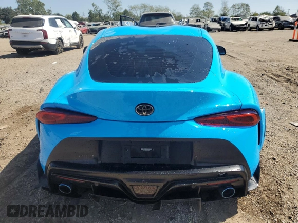 2021 Toyota Supra 2.0 with VIN WZ1DB2C04MW039858, listed as a Copart auction lot 70049874 with 10,586 mi miles and Salvage title. Bid and sale history available at DreamBid. Image 6.