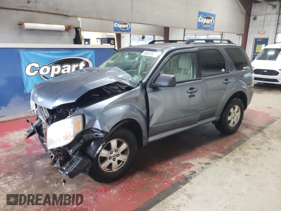 2010 Mercury Mariner z VIN 4M2CN9B70AKJ24170, wystawiony jako Copart lot #49241535 z przebiegiem 118 661 mil mil oraz Szkody całkowita. Historia ofert i sprzedaży dostępna na DreamBid. Obrazek 1.