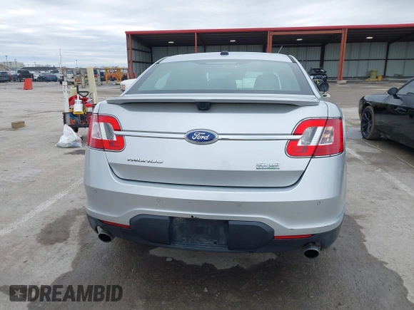 2012 Ford Taurus SHO z VIN 1FAHP2KT6CG142954, wystawiony jako IAAI lot #41526760 z przebiegiem 187 887 mil mil oraz . Historia ofert i sprzedaży dostępna na DreamBid. Obrazek 16.