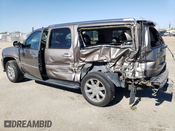 2014 GMC Yukon XL Denali with VIN 1GKS2MEF1ER107346, listed as a Copart auction lot 67927133 with 77,793 mi miles and Salvage Title. Bid and sale history available at carsss.com. Image 2.